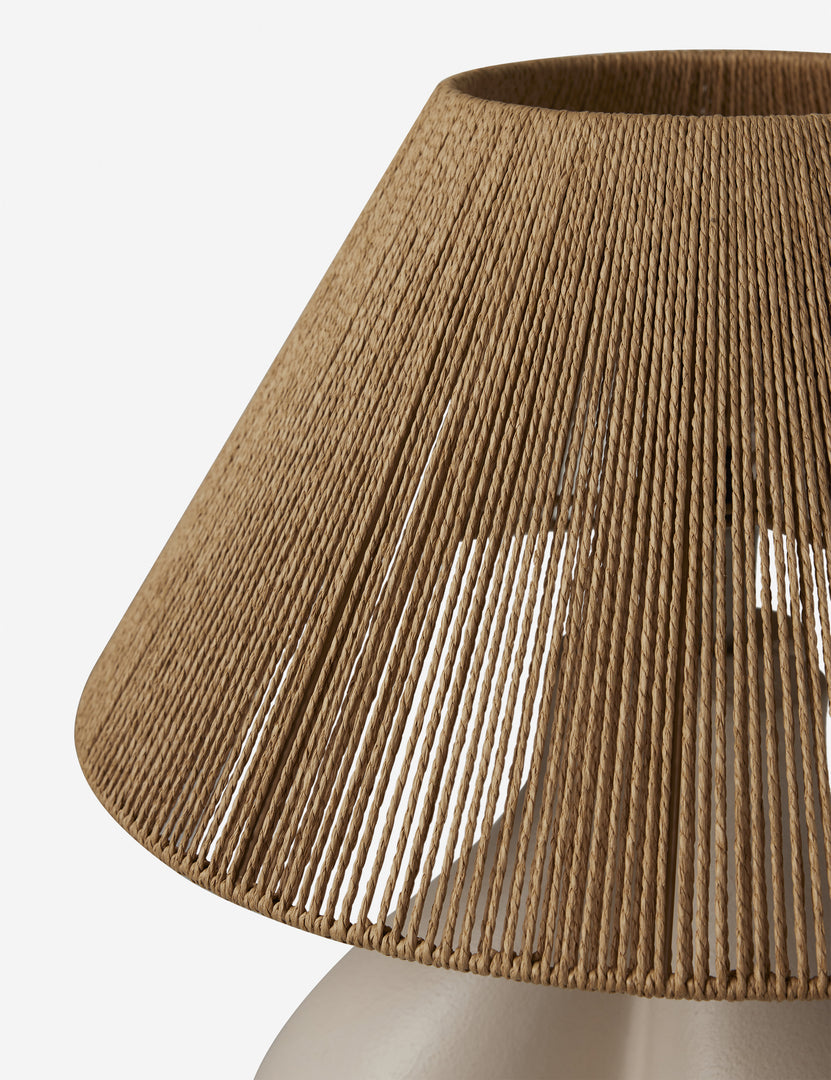 #color::gray | Close up view of the Gustav woven shade sculptural table lamp.