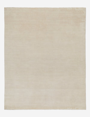 Heritage ivory 100% wool hand-knotted rug with fringe detailing