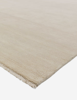 Fringed corner of the heritage ivory rug