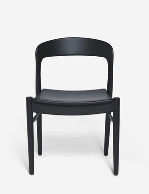 Ida black teak wood dining chair.