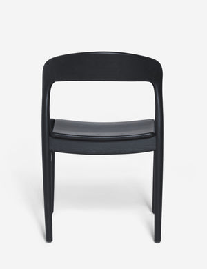 Rear view of the Ida black teak wood dining chair.