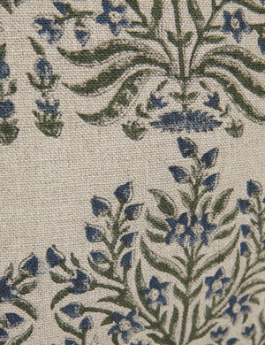 Close-up of the ornate floral pattern on the Ixora pillow