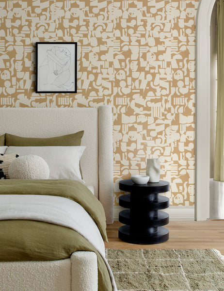 #color::tan-+-ivory | Ivory and taupe Organic Shapes Wallpaper by Sarah Sherman Samuel is in a bedroom with a boucle framed bed, a khaki green area rug, and a black nightstand