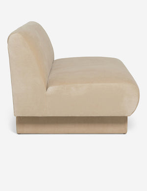 Side of the Lena armless brie beige velvet sofa