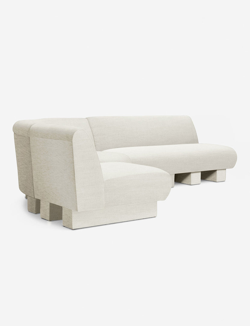 #color::Natural-Linen #configuration::left-facing #size::114-W | Angled view of the Lena left-facing natural linen sectional sofa with upholstered beam legs.