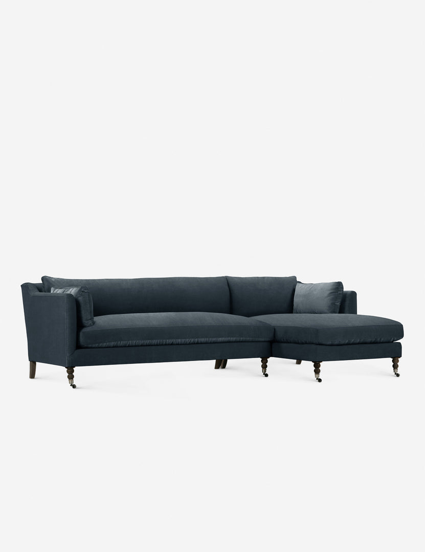 #color::blue-modern-velvet #configuration::right-facing #leg-finish::chocolate-and-pewter | Fabienne left-facing blue velvet sectional with antique curved legs in the back with ornate turned legs in the front with wheels