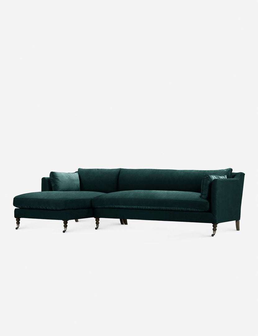 #color::green-modern-velvet #configuration::left-facing #leg-finish::chocolate-and-pewter | Fabienne left-facing green velvet sectional with antique curved legs in the back with ornate turned legs in the front with wheels