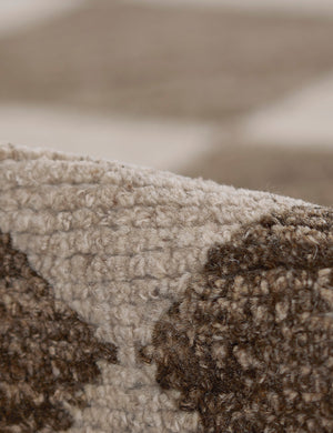 The hand-knotted wool construction on the Palau brown rug