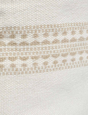 White traditional design on the Marchesa natural and khaki indoor and outdoor pillow