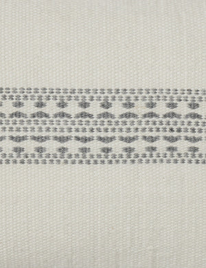 White traditional design on the Marchesa natural and agate gray indoor and outdoor pillow