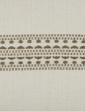 White traditional design on the Marchesa natural and moss green indoor and outdoor pillow