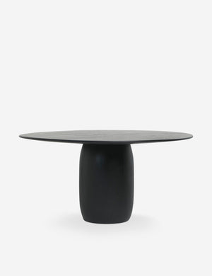 Maroko black round dining table with a tapered pedestal base