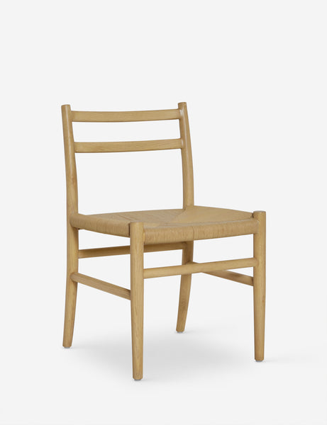 #color::natural-oak | Angled view of the Nicholson slim natural oak wood frame and woven seat dining chair.