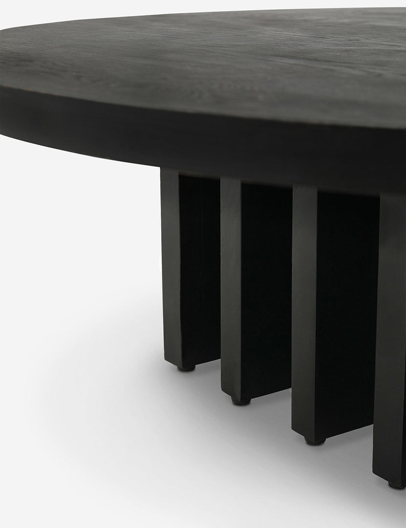 #color::black | Rim and base of the Pentwater black wooden Round Coffee Table