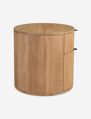 Side view of the Kono 2-drawer round oak nightstand.