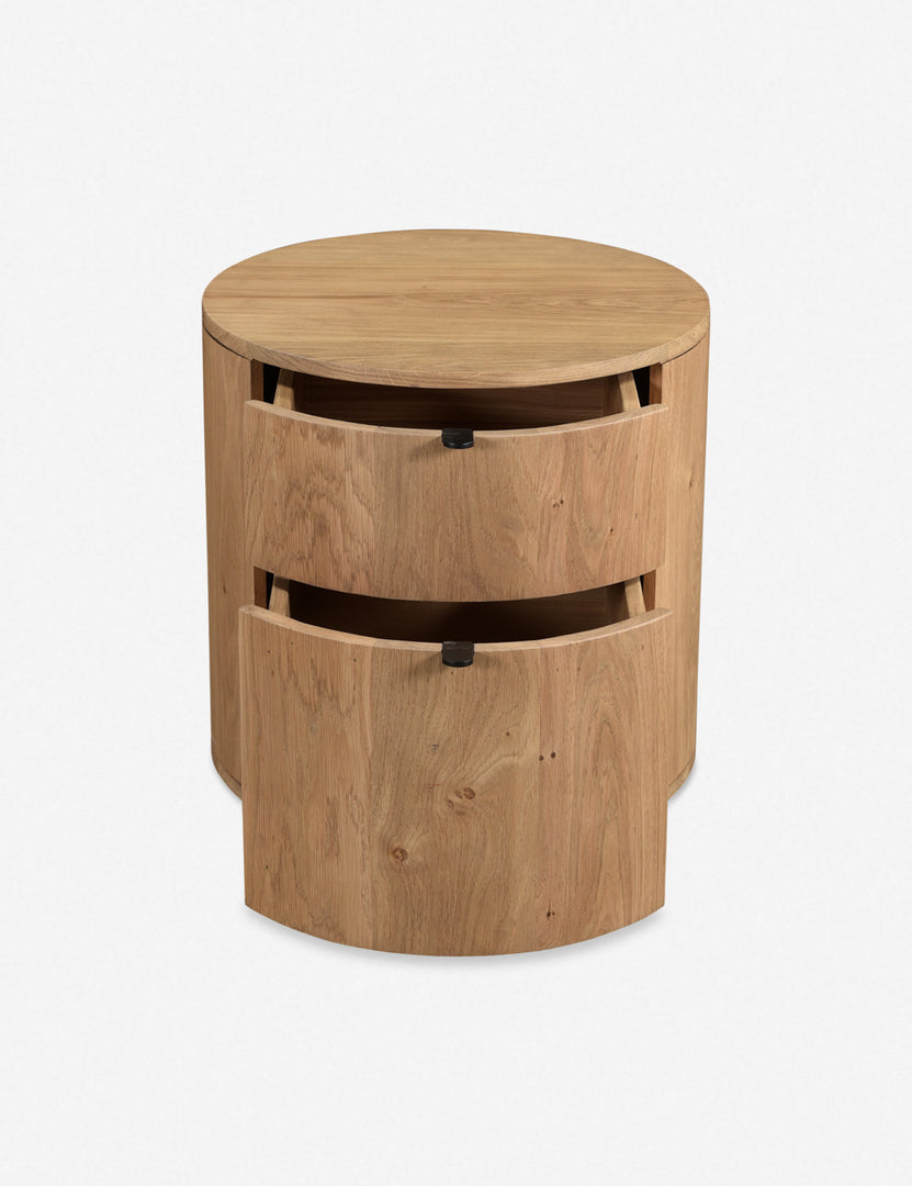 #color::natural | Kono 2-drawer round oak nightstand with both drawers slightly opened.