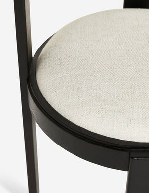 Close up of the ivory cushion and black frame on the Tobie Dining Chair (Set of 2)