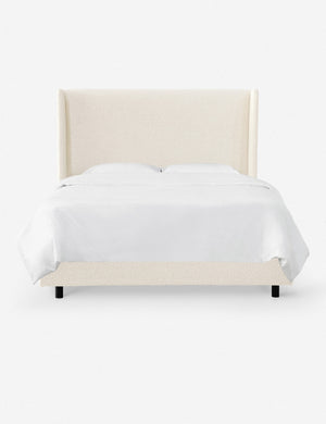 Adara cream sherpa upholstered bed.