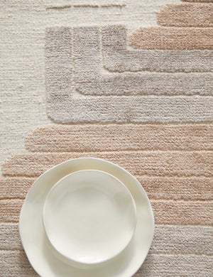 Bird's-eye view of the Colette Rug with two white bowls sitting atop it
