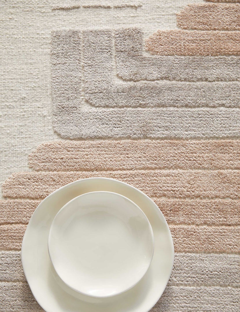 #size::2-6--x-8- #size::6--x-9- #size::8--x-10- #size::9--x-12- #size::10--x-14- #size::12--x-15- | Bird's-eye view of the Colette Rug with two white bowls sitting atop it