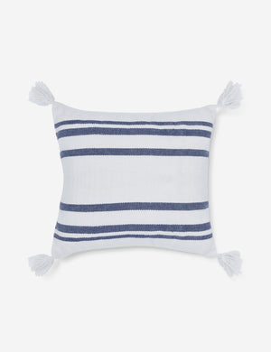 Fez indoor and outdoor white throw pillow with weather-resistant fabric, blue stripes, and fringe on all four corners