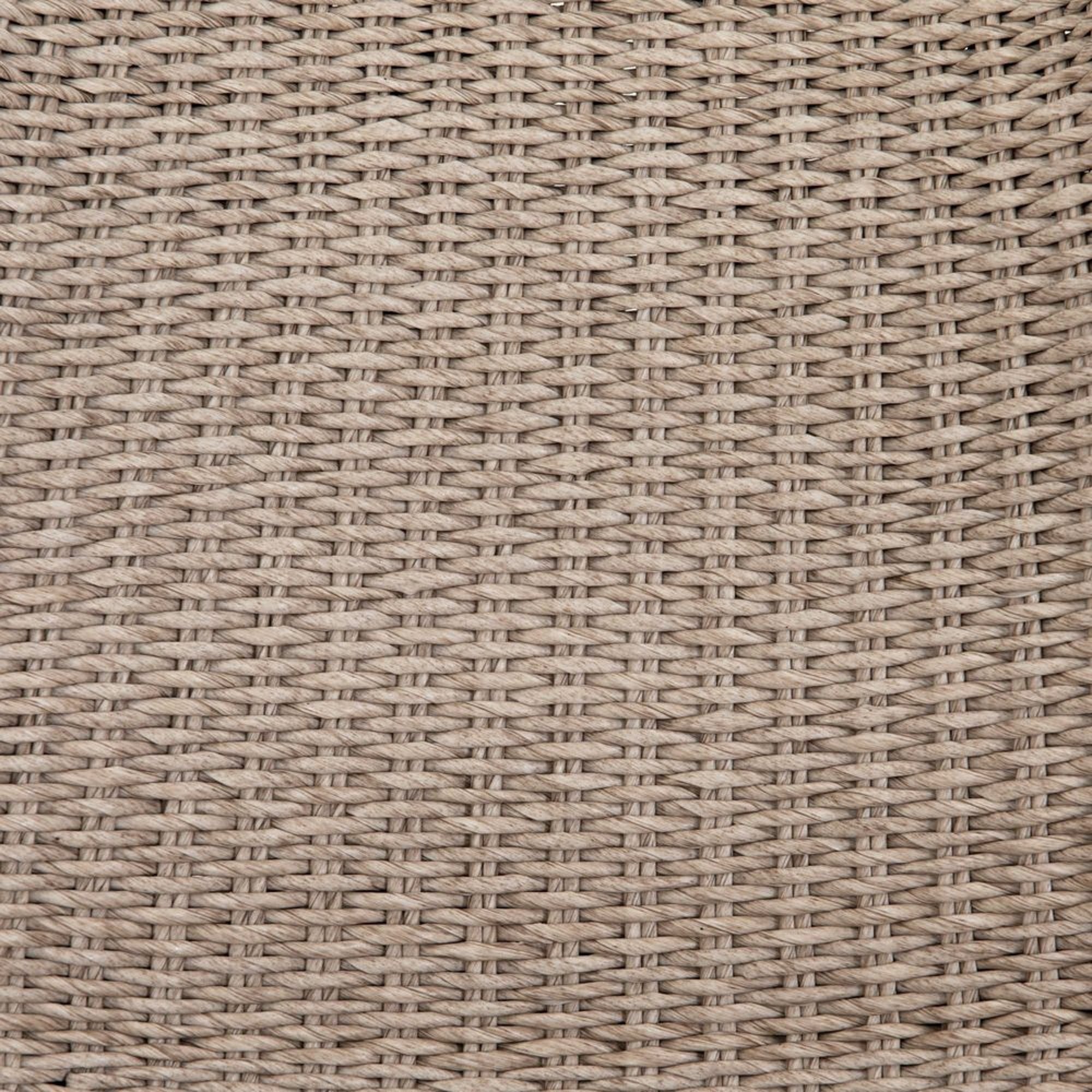 Detailed shot of the woven wicker on the Manila wicker weave beige indoor and outdoor dining chair