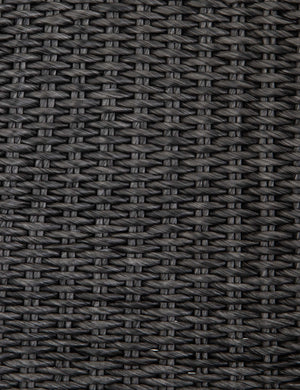 Detailed shot of the black woven wicker on the Manila wicker weave black indoor and outdoor dining chair