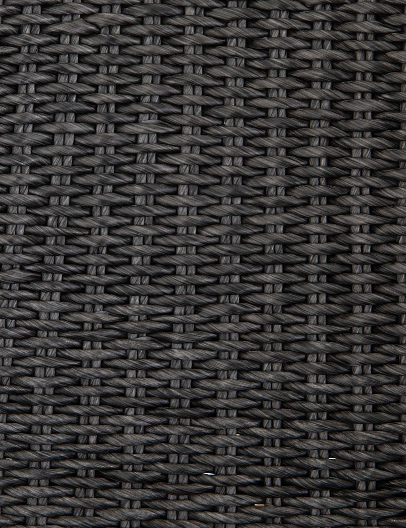 #color::Vintage-Coal  | Detailed shot of the black woven wicker on the Manila wicker weave black indoor and outdoor dining chair