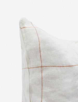 Corner of the Lucian white and rust square pillow