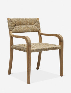 Angled view of the Nolani woven rattan arm chair