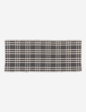 Rika black and white cotton machine washable mat with checkerboard pattern in its runner size