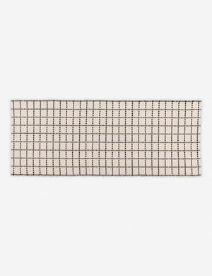 Sebou natural and black dotted machine washable mat in its runner size