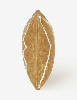 Side view of the Moroccan ochre and natural beni ourain inspired lumbar flat weave pillow by Sarah Sherman Samuel