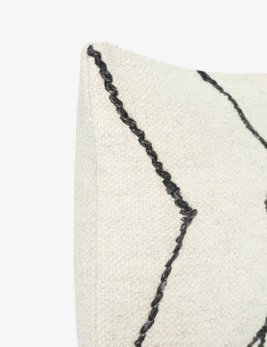 Close-up of the corner of the Moroccan black and natural beni ourain inspired lumbar flat weave pillow by Sarah Sherman Samuel