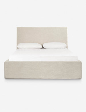 Paxton natural linen upholstered slipcover bed with a rectangular headboard