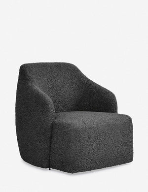 Angled view of the Tobi Slate Boucle swivel chair