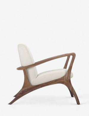 Side view of the Venturi white upholstered accent chair